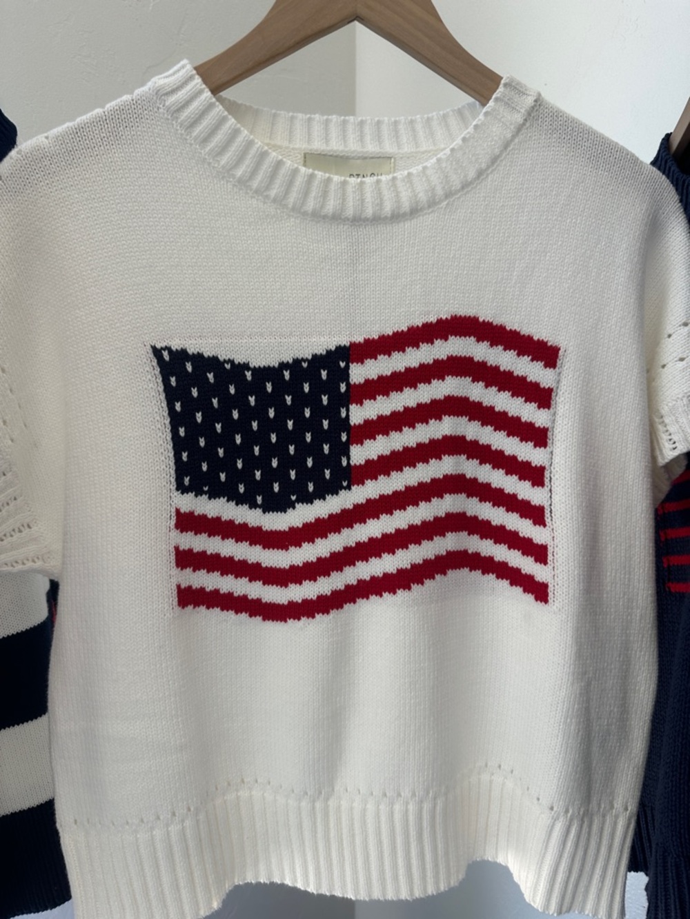 USA flag sweater. Pinch. Short sleeve. Eyelet detail.